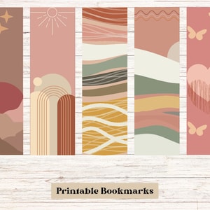 May include: Set of five printable bookmarks featuring abstract designs in shades of pink, brown, yellow, and green. The designs include a sunset, a rainbow, wavy lines, a heart with butterflies, and a sun with stars.