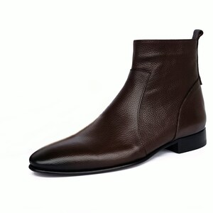 May include: A brown leather ankle boot with a pointed toe and a zipper on the side.