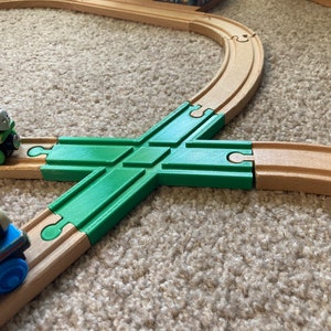 Wooden train track X connector