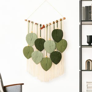 Väggbonad med grönt blad av makrame: Boho vävd gobeläng