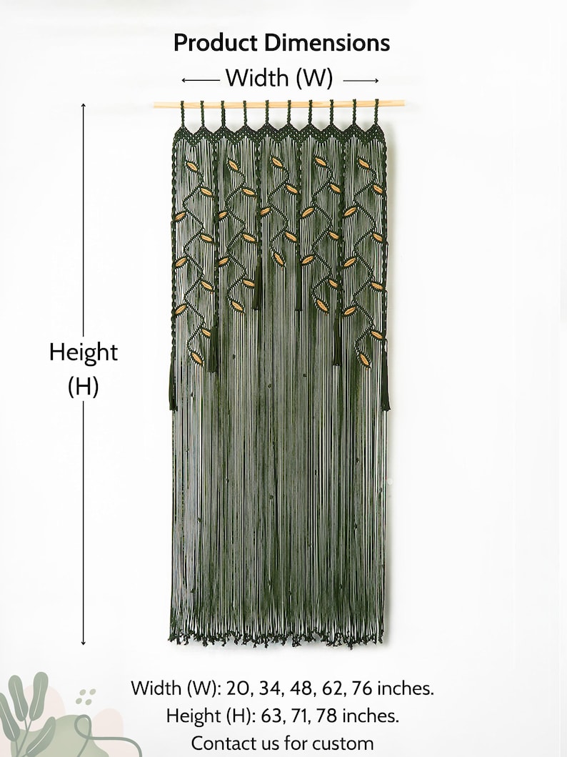 Dark green macrame wall tapestry and doorway divider creating a bold biophilic statement backdrop in a bright home interior