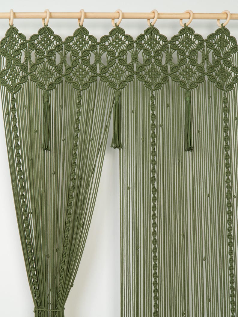 Boho room divider providing a soft, organic transition between a living room and hallway.