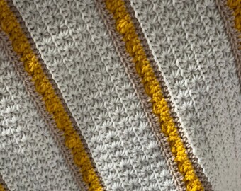 Handmade crochet baby blanket in star stitch with shell border