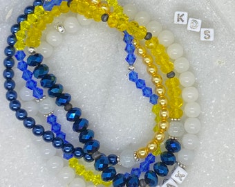 Peace for Ukraine Bracelet Set, proceeds donated to World Central Kitchens.