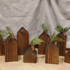 Wooden village candle holders