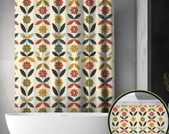 May include: A floral patterned shower curtain with a matching bath mat. The design features stylized flowers in red, yellow, and green, set against a cream background. The curtain hangs above a white bathtub, creating a cohesive bathroom set.