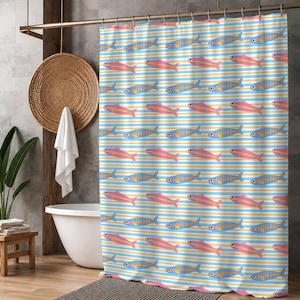 May include: A shower curtain with a repeating pattern of colorful fish in pink, blue, and yellow, set against a backdrop of horizontal stripes in the same colors. The curtain is hanging in a bathroom setting.