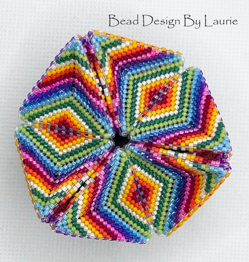 Rainbow Kaleidocycle Digital Peyote Pattern. This is a digital pattern on how to make a beaded 3D peyote Kaleidocycle. I have included a tutorial on how to make the Kaleidocycle with pictures and a word chart and list of beads needed.