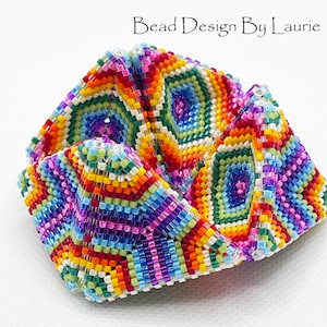 Rainbow Kaleidocycle Digital Peyote This is a digital pattern on how to make a beaded 3D peyote Kaleidocycle. I have included a tutorial on how to make the Kaleidocycle with pictures and a word chart and list of beads needed. Pattern.