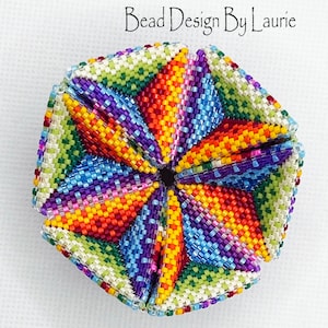 Rainbow Kaleidocycle Digital Peyote Pattern. This is a digital pattern on how to make a beaded 3D peyote Kaleidocycle. I have included a tutorial on how to make the Kaleidocycle with pictures and a word chart and list of beads needed.
