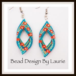 May include: A pair of dangle earrings featuring a diamond-shaped woven bead pattern in turquoise, orange, and metallic gold. The earrings hang from silver-toned metal hooks. The text "Bead Design By Laurie" is printed below the earrings.