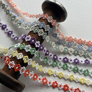 Ditsy Flower Embroidered ribbon trim. Lots of colours. Sold by the metre