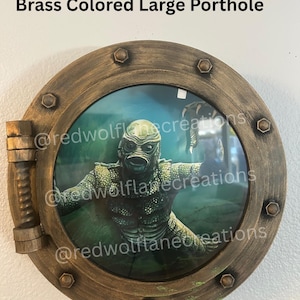 Image showcasing Large Creature From the Black Lagoon Porthole Wall Decor | LED Horror ...