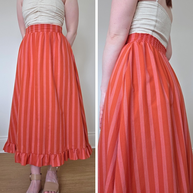 May include: A long, red and white striped skirt with a ruffled hem. The skirt is made of a lightweight fabric and has a relaxed fit.