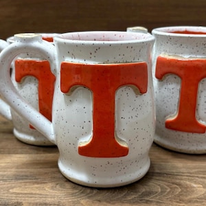 Mug, orange and white, Tennessee, handmade pottery