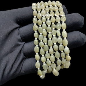 Natural Green Cat&#39;s Eye Oval Beads: 5MM-7MM Gemstone Strand