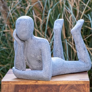 Modern sculpture figure cast sandstone &quot;Lying Man&quot; | Dimensions 31x14x19 cm | Decorative figure for any living area, balcony, and garden