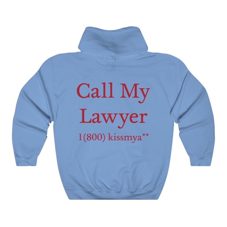 May include: Light blue hooded sweatshirt with the text "Call My Lawyer 1 (800) kissmya**" printed in red.