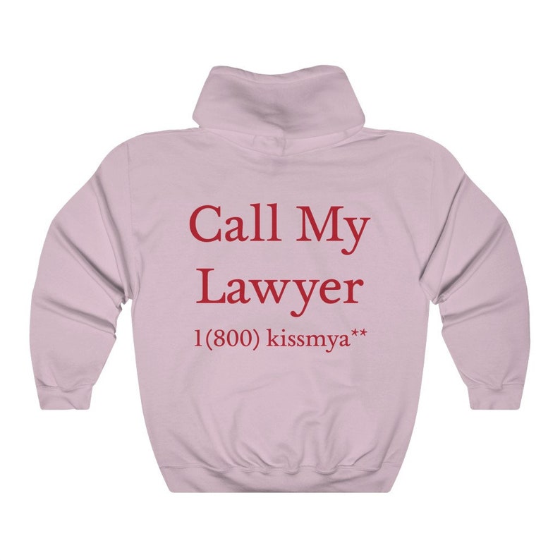 May include: Pink hooded sweatshirt with the text "Call My Lawyer 1 (800) kissmya**" printed on the back.