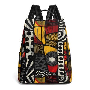 May include: A patterned backpack with a vibrant abstract design. The bag features a mix of black, white, yellow, and red geometric shapes. It has black leather straps and a top handle.