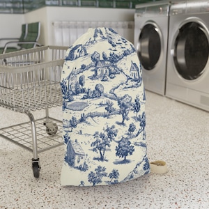 Op vintage geïnspireerde waszak. Waszak met riem. Wasmand. Wasmand. Stoffen waszak
