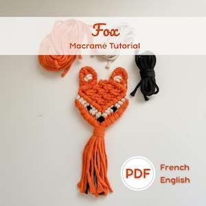 May include: An orange macramé fox with white and black accents, featuring a tassel tail. The image includes the text "Fox Macramé Tutorial" and a PDF icon with "French English" text.