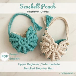 May include: Two macramé seashell pouches, one turquoise and one cream, with matching handles and tassels. The image includes text that reads "Seashell Pouch Macramé Tutorial" and "Upper Beginner / Intermediate Detailed Step-by-Step".