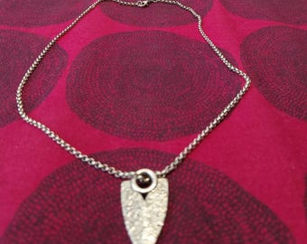 This silver  necklace advice you to live your dream