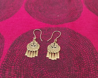 The smallest Kuutar earrings from Kalevala Koru in Finland are preowned