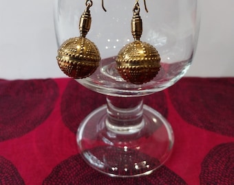 Filigree earrings made by Kalevala Koru in Finland