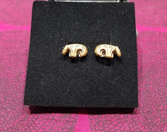 Bronze earrings called the Bear made by Kalevala Koru