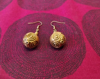 Halikko spiral earrings made of bronze by Kalevala koru