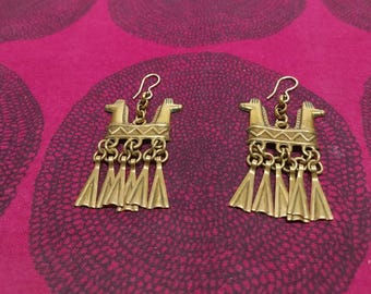 Rares boucles d'oreilles Kalevala appelées le cheval à deux têtes