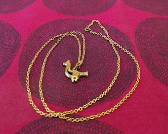 Collier petit oiseau fabriqué par Kalevala Koru en Finlande