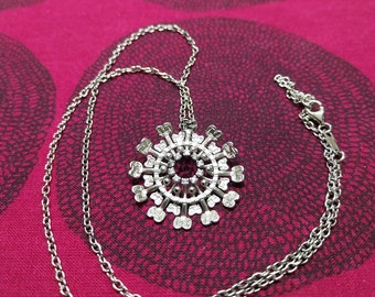 Beautiful  silver The Sun necklace designed by Tapio Wirkkala