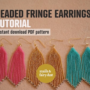 May include: Image of beaded fringe earrings in pink, gold, and teal, with gold-colored ear wires. The image includes text that reads "BEADED FRINGE EARRINGS TUTORIAL instant download PDF pattern". The earrings are displayed on a neutral background.