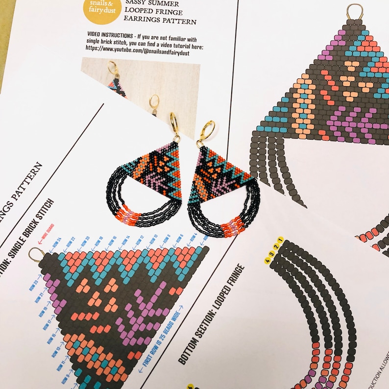 May include: A pair of beaded earrings with a geometric pattern in shades of black, orange, pink, and turquoise. The earrings feature a looped fringe detail at the bottom. The image also includes instructions for making the earrings.