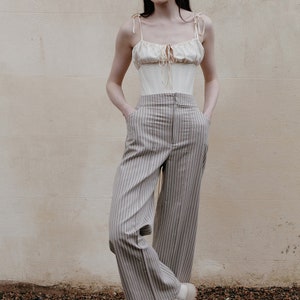 up-cycled ticking high waisted trousers image 1