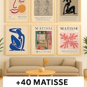 May include: A collection of six framed Matisse art prints displayed above a sofa and coffee table. The prints feature abstract figures and shapes in various colors, including blue, black, and pink. The text "MATISSE" and "BERGGRUEN & CIE" are visible on the prints. The text "+40 MATISSE WALL ART BUNDLE" is at the bottom.