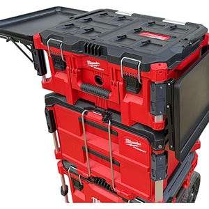May include: A red and black stackable toolbox with a fold-down work surface. The toolbox is labelled "Milwaukee Packout".