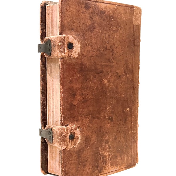 Old leather book with clasps, 1814 Lutheran hymnal with frontispiece of Martin Luther. Henry Melchior Muhlenberg, Pennsylvania imprint