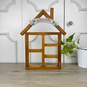 Vintage House Shaped Wooden Display Rack for Collectables with Hand Painted Welcome Banner
