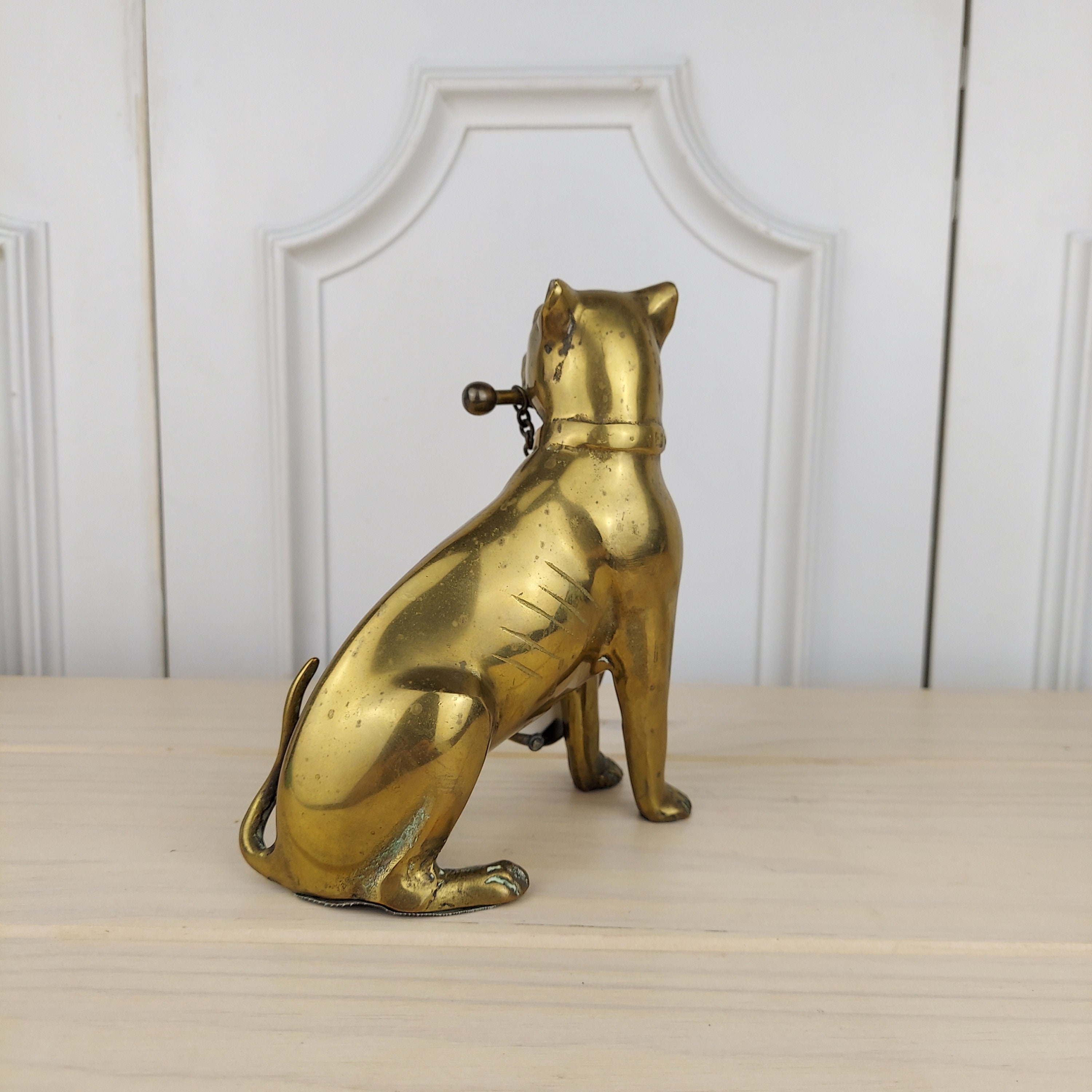 Vintage Brass Dog Holding a Bone With a Suspended Picture Frame