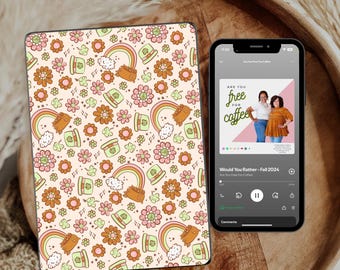 May include: A phone screen displaying a podcast episode titled "Are You Free For Coffee?" with a green, white, and orange shamrock and rainbow pattern in the background. The podcast is titled "Would You Rather - Fall 2024".
