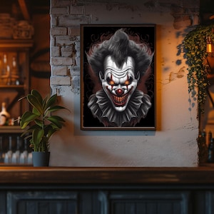 May include: A framed illustration of a scary clown with a white face, red nose, and a wide, toothy grin. The clown is wearing a black and white ruffled collar and is set against a dark background with a red and black design.