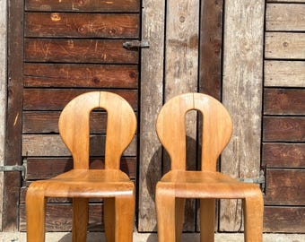 Le sedie vintage italiane in compensato sono state disegnate da Gigi Sabadin per Stilwood negli anni '70