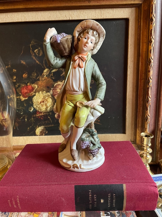 Vintage Bisque Porcelain Figurine of Young Man with Grapes