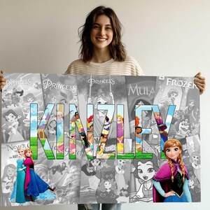A smiling woman holding a poster with the name 'KIMLEY' prominently displayed in the center. The poster is a collage of various characters and scenes from popular Disney princesses and movies.