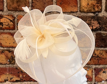 New cream large mesh loop flower fascinator with feathers