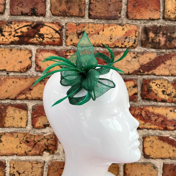New Green small flower sinamay fascinator clip and brooch with loops and feathers